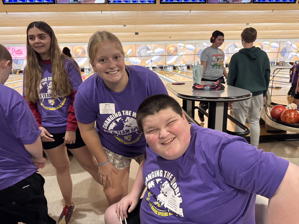 Unified Special Olympic athletes and partners at bowling tournament