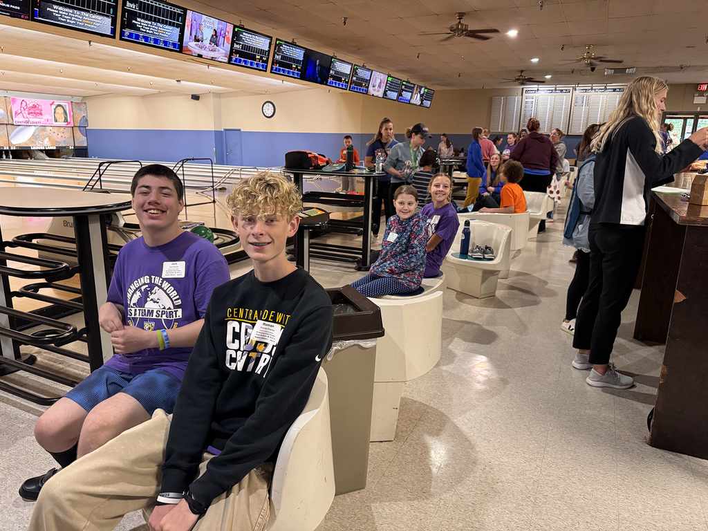 Unified Special Olympic athletes and partners at bowling tournament