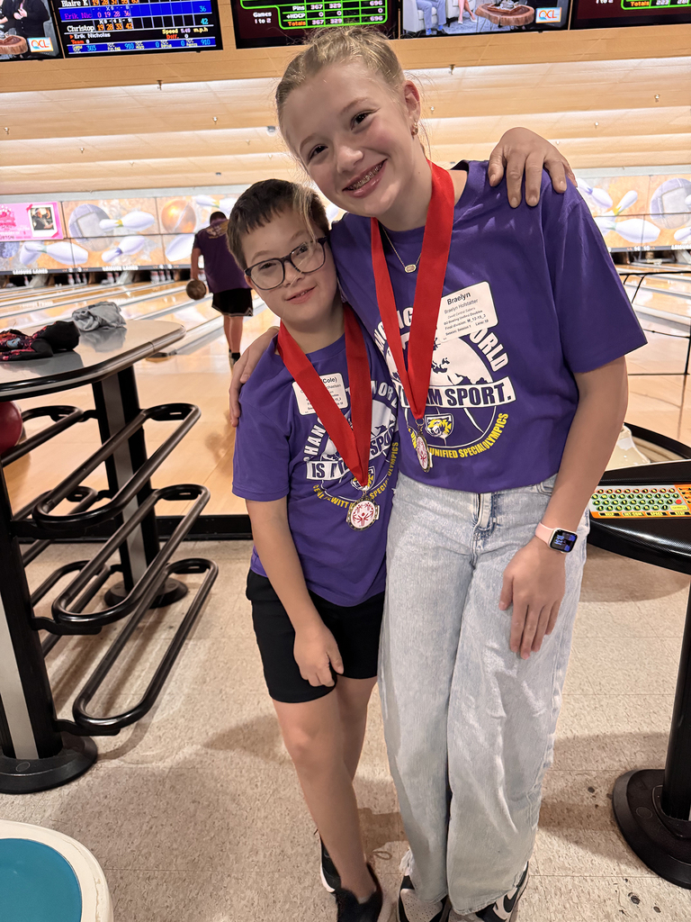 Unified Special Olympic athletes and partners at bowling tournament