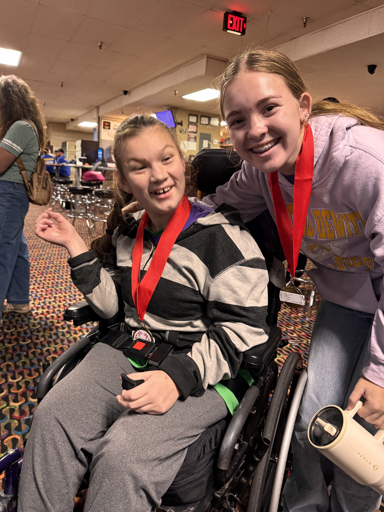 Unified Special Olympic athletes and partners at bowling tournament