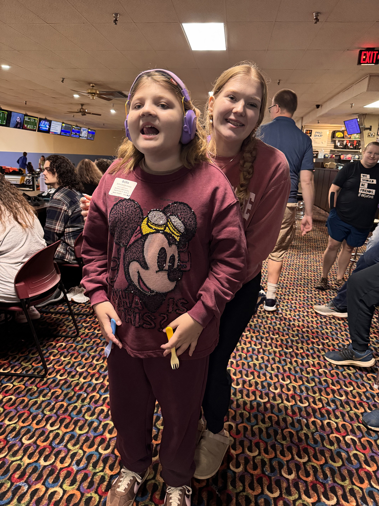 Unified Special Olympic athletes and partners at bowling tournament