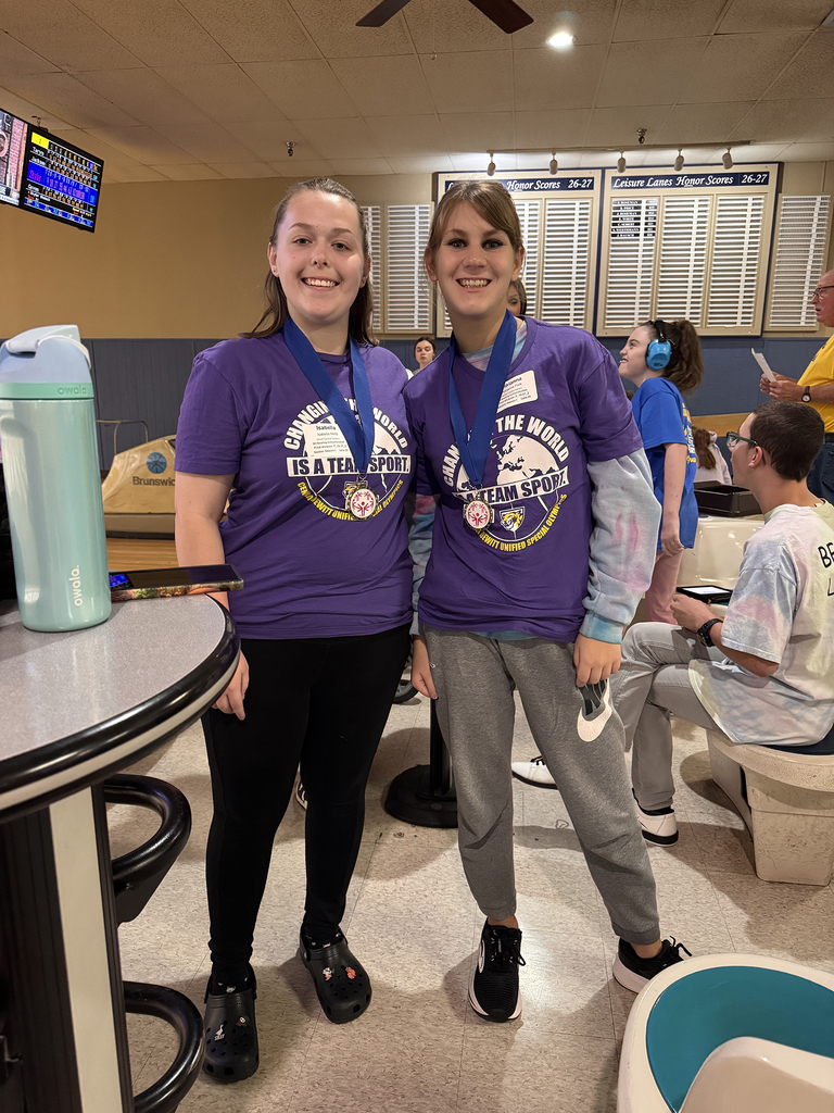 Unified Special Olympic athletes and partners at bowling tournament