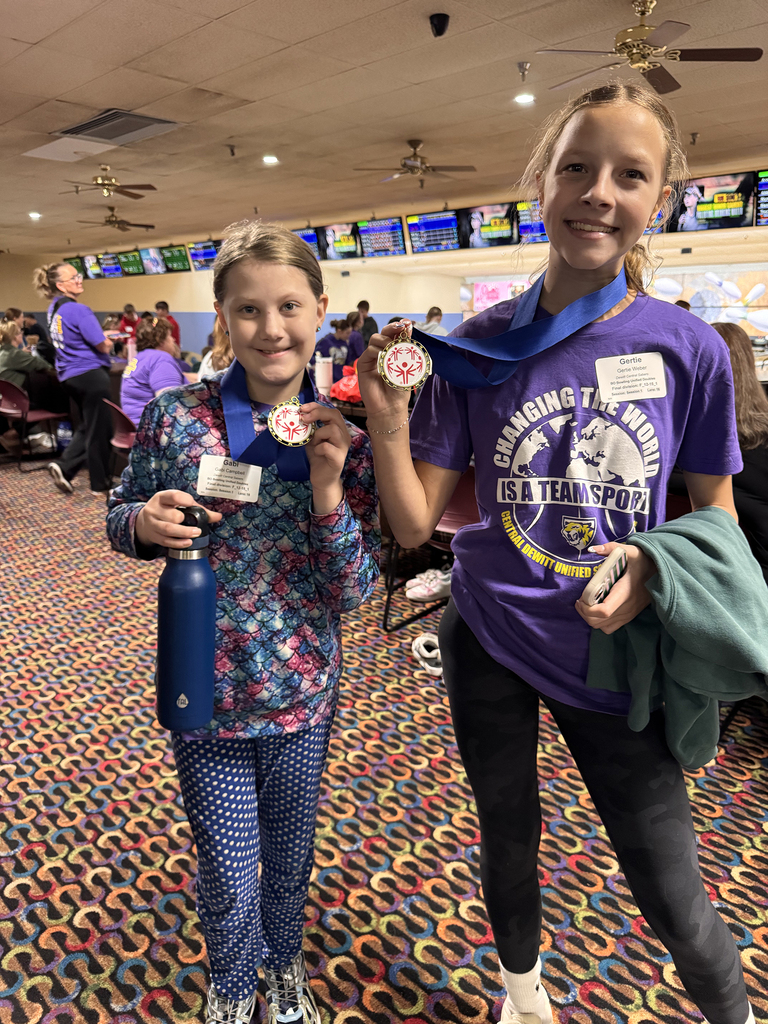 Unified Special Olympic athletes and partners at bowling tournament