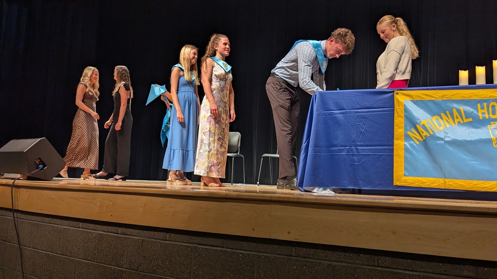 New members being inducted during ceremony