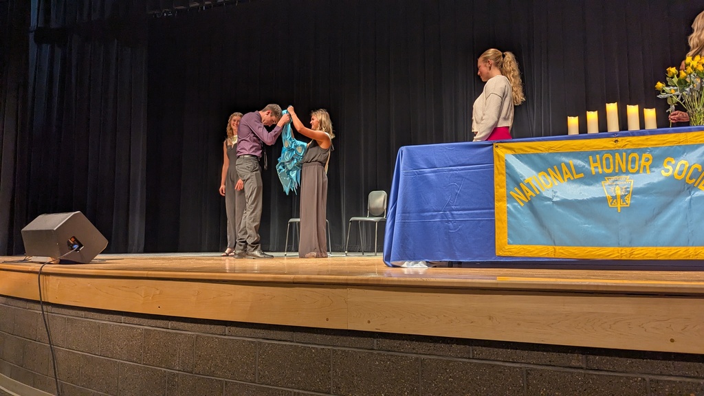 Cooper Barber being given his stole