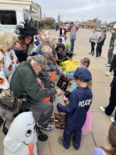 Preschoolers trick or treating downtown