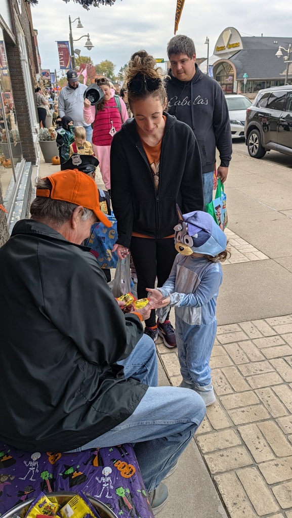 Preschoolers trick or treating downtown
