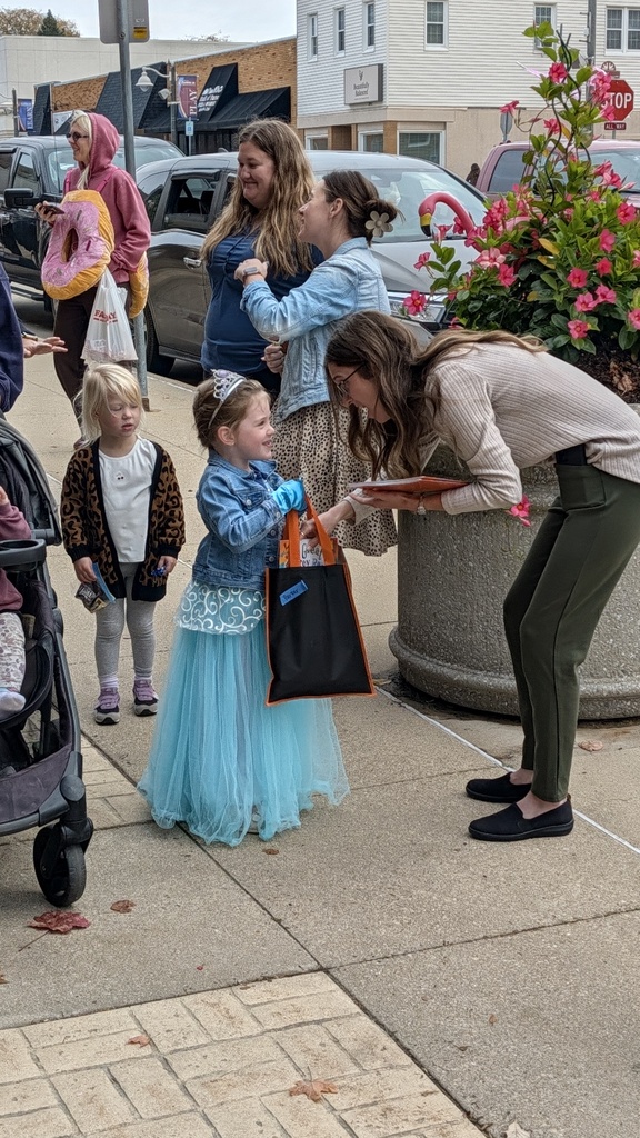 Preschoolers trick or treating downtown
