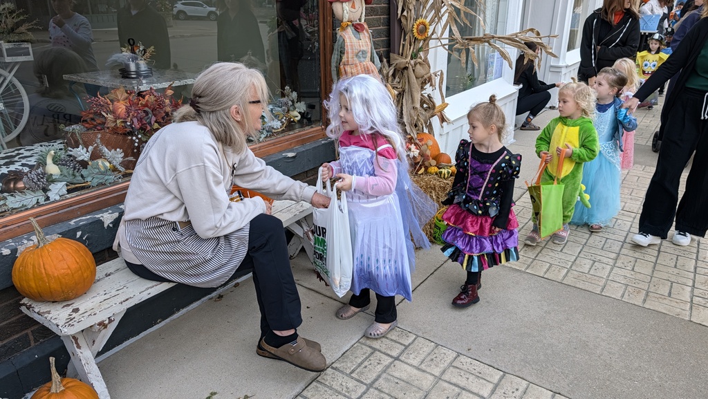 Preschoolers trick or treating downtown