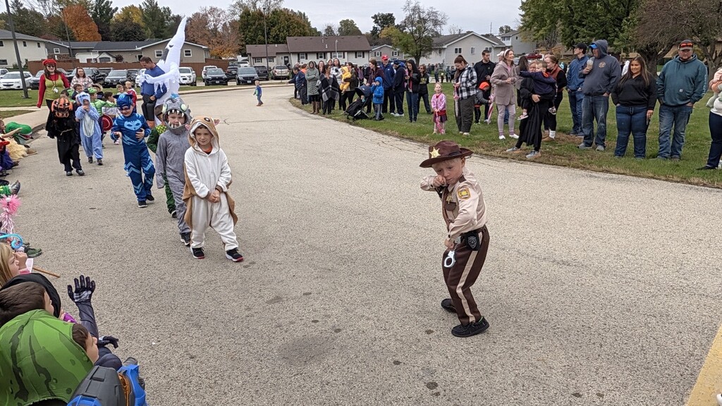Jumpstart Kindergartners showing off their Halloween costumes in the parade