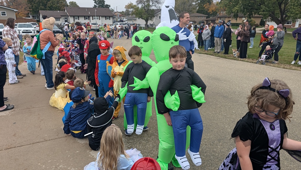 Second graders showing off their Halloween costumes in the parade