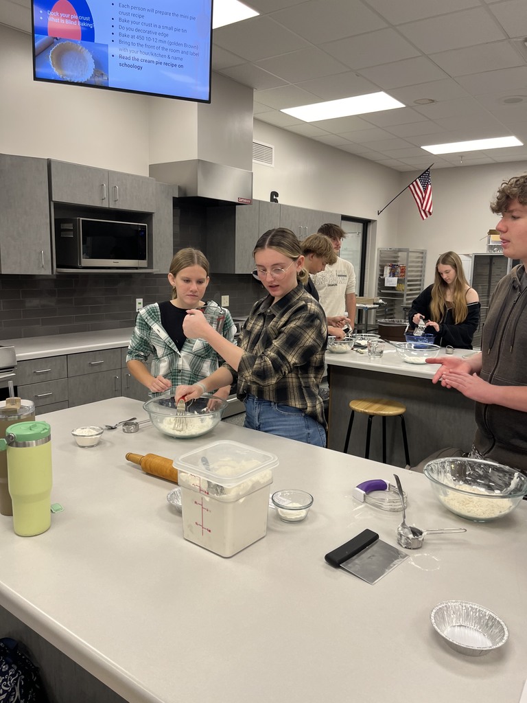 Students making pie crust