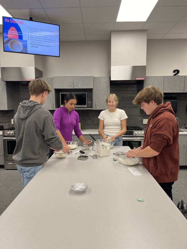 Students making pie crust