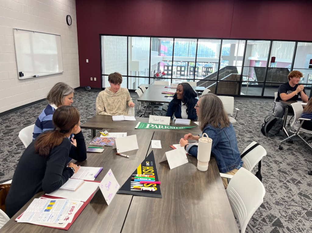 Students meeting with teachers