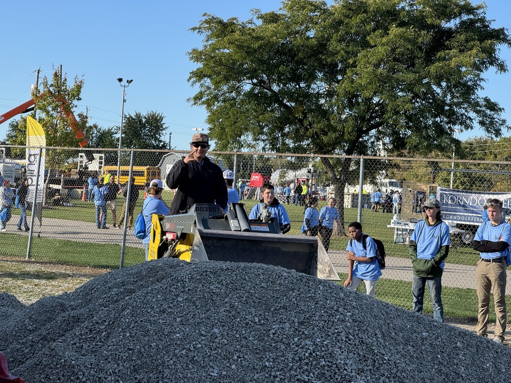 Students operating machinery