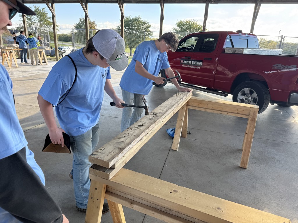 Students with hammers