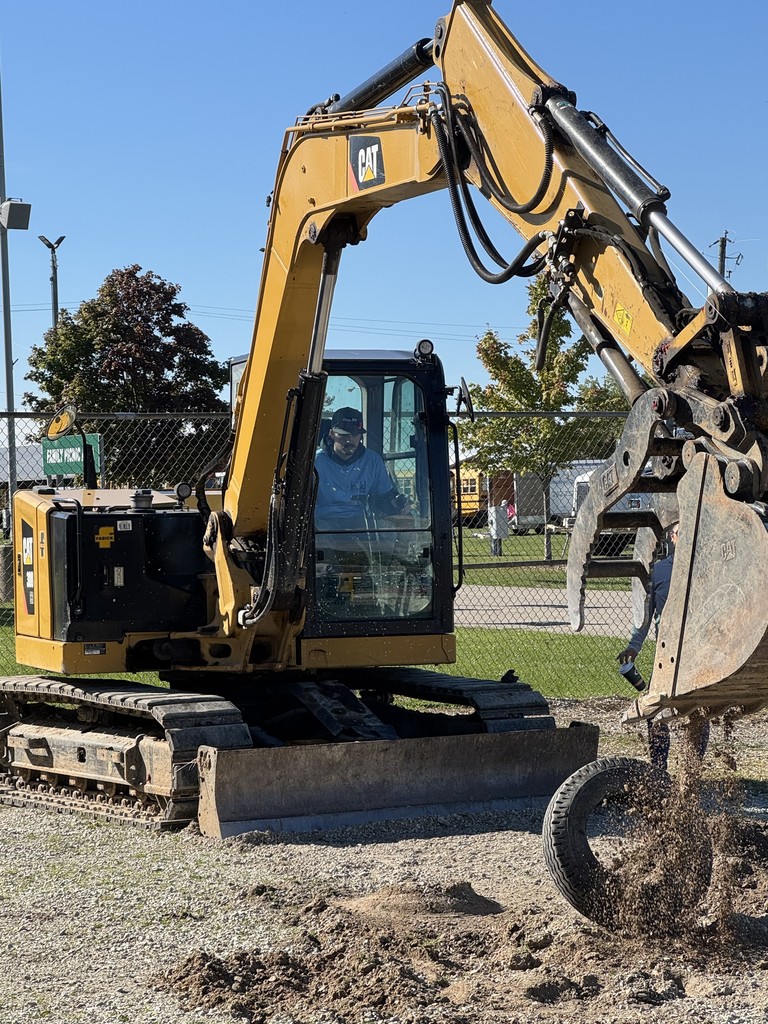 Students operating machinery