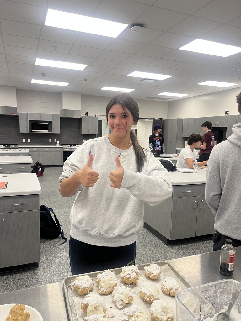 Student with Cream Puffs