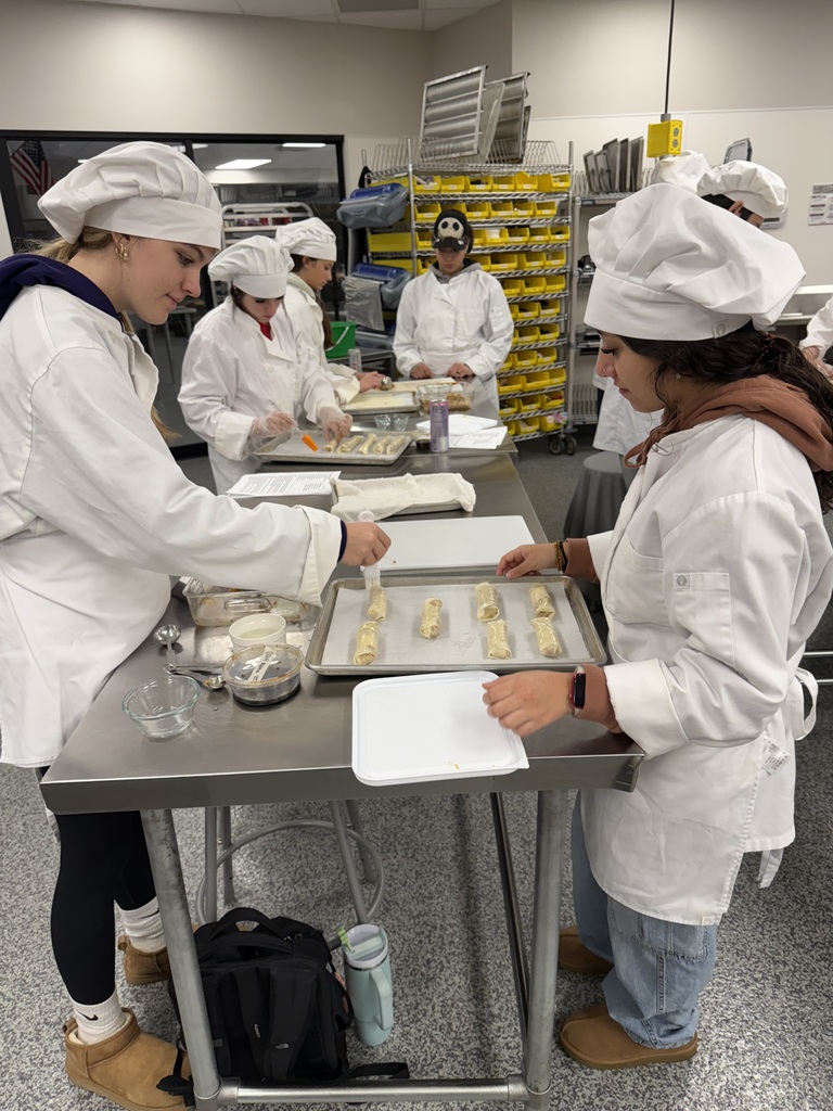 Students working in a kitchen