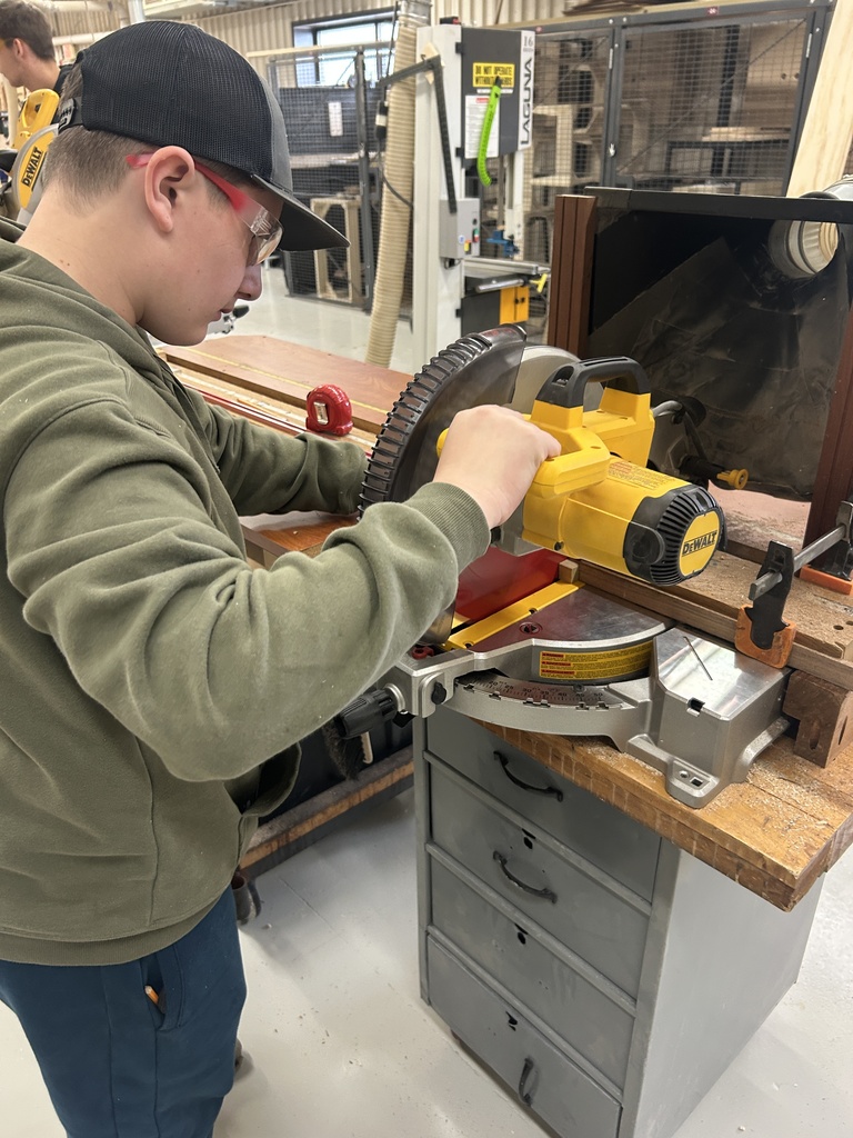 Student using a saw