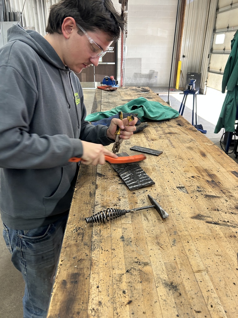 Student working with tools