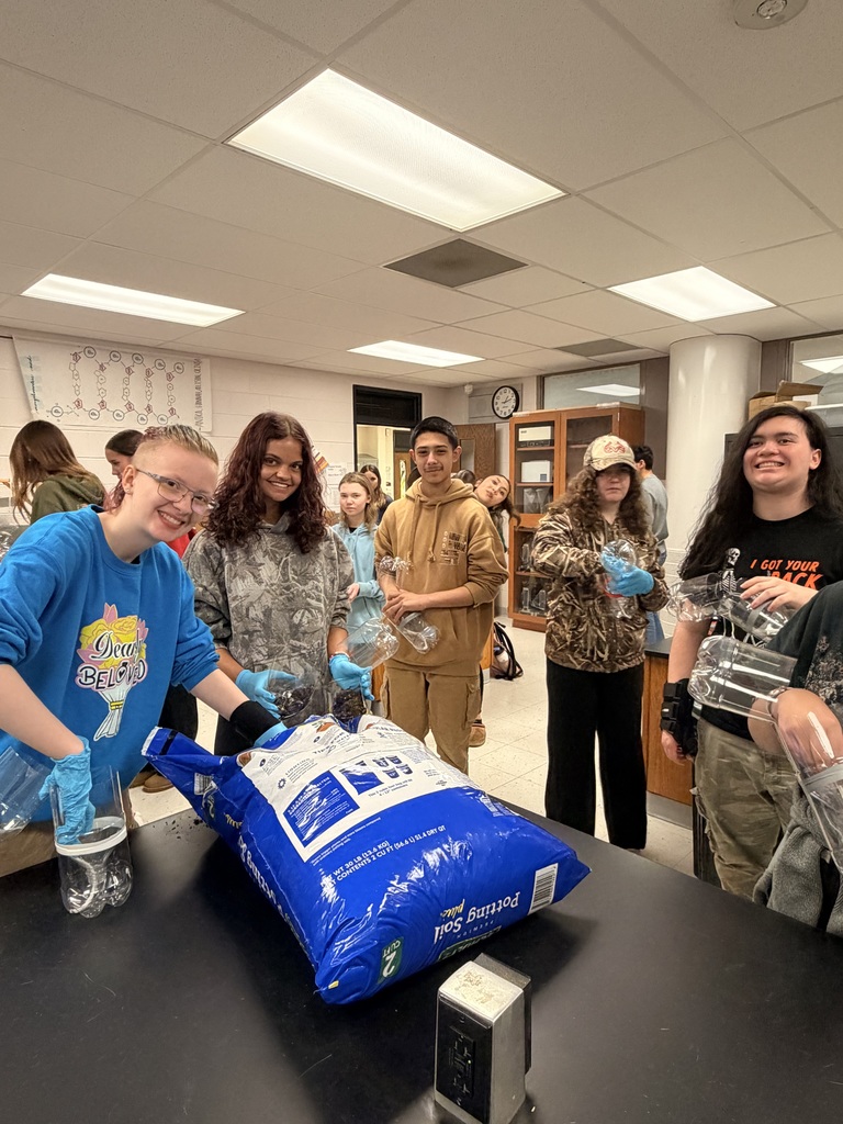 Students planting seeds