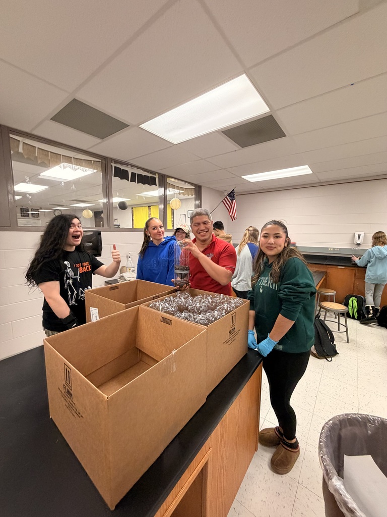 Students planting seeds