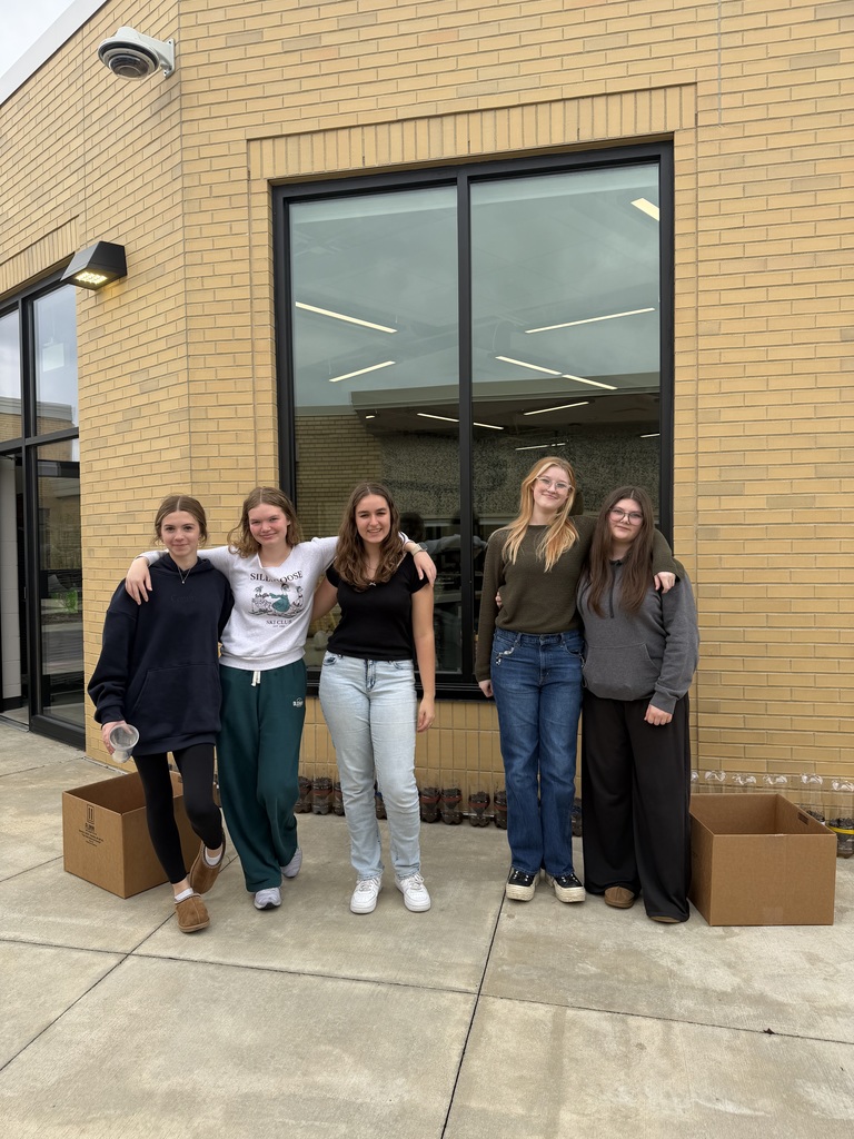 Students planting seeds