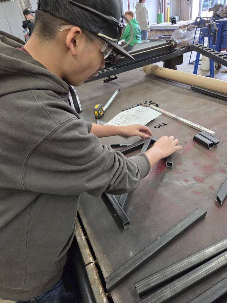 Student working in a shop