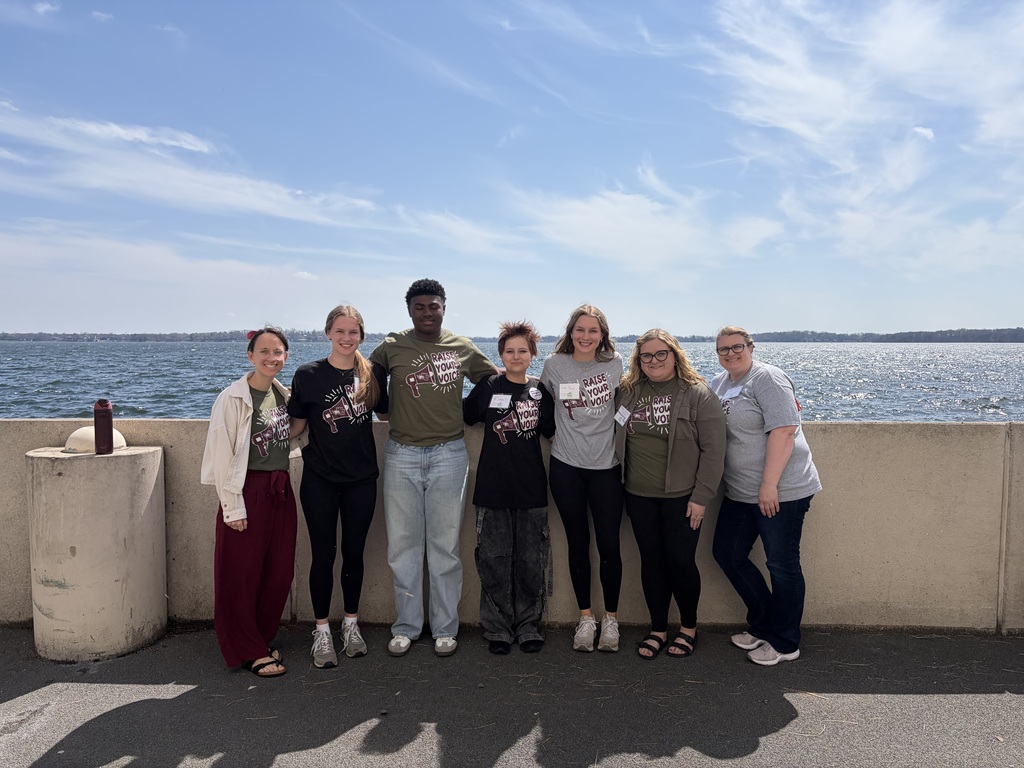 Group of people in front of the lake