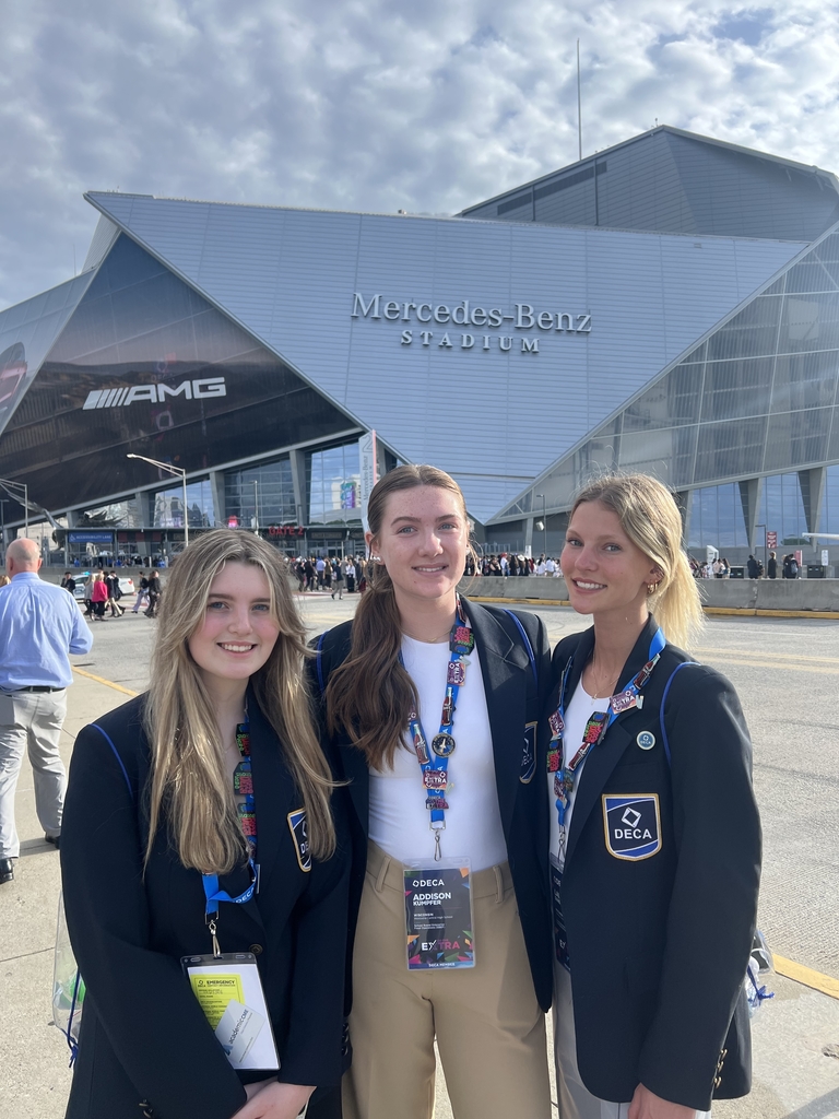 Students in front of stadium