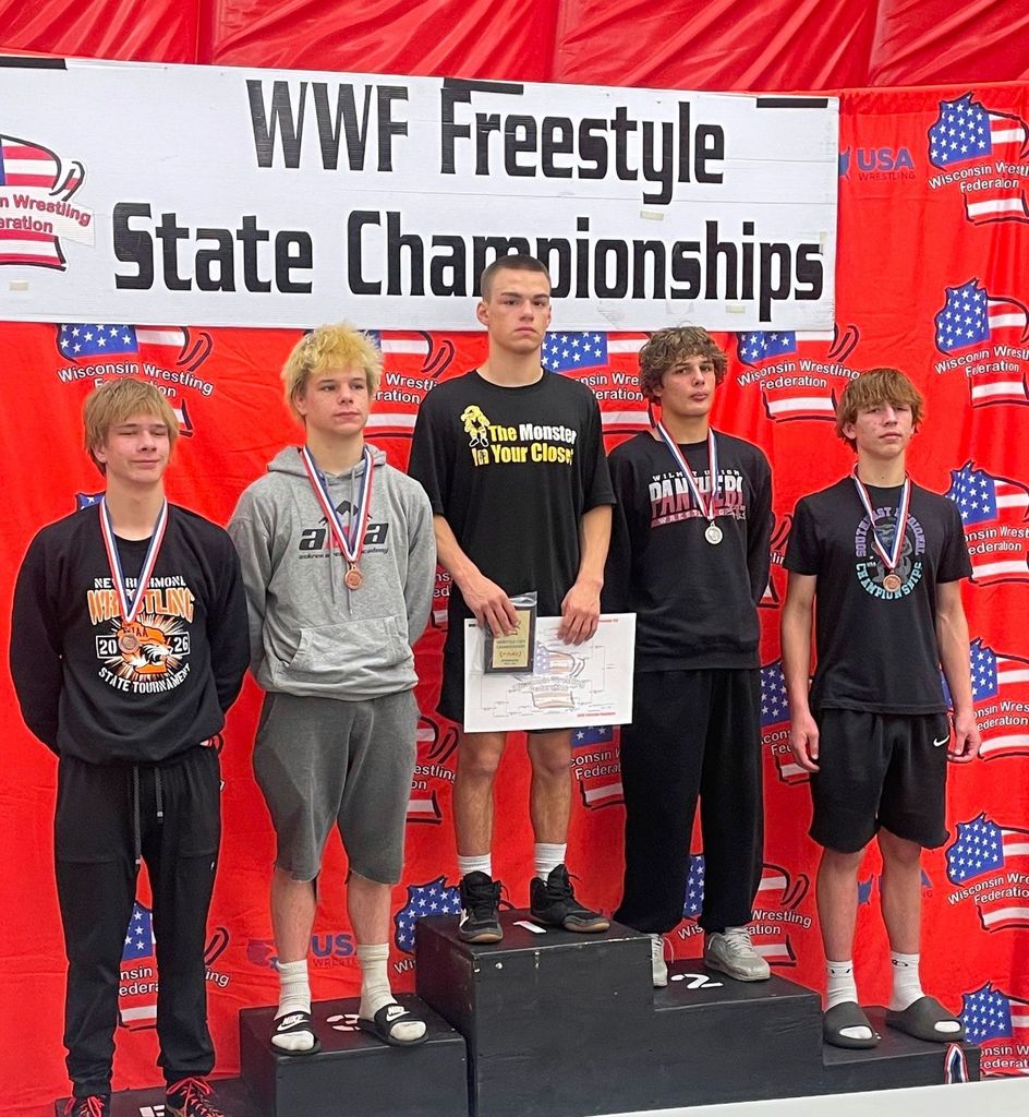 Wrestlers on podium