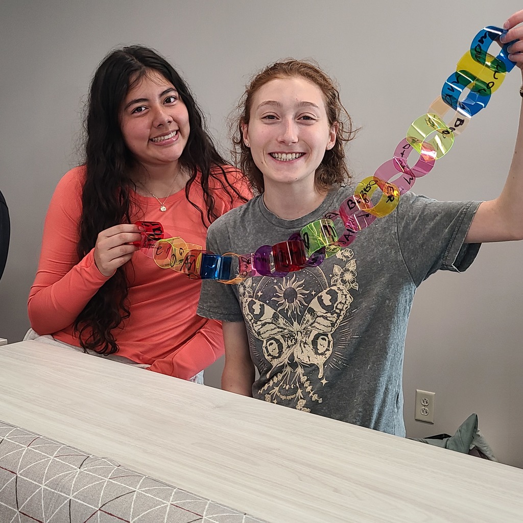Students holding paper chain