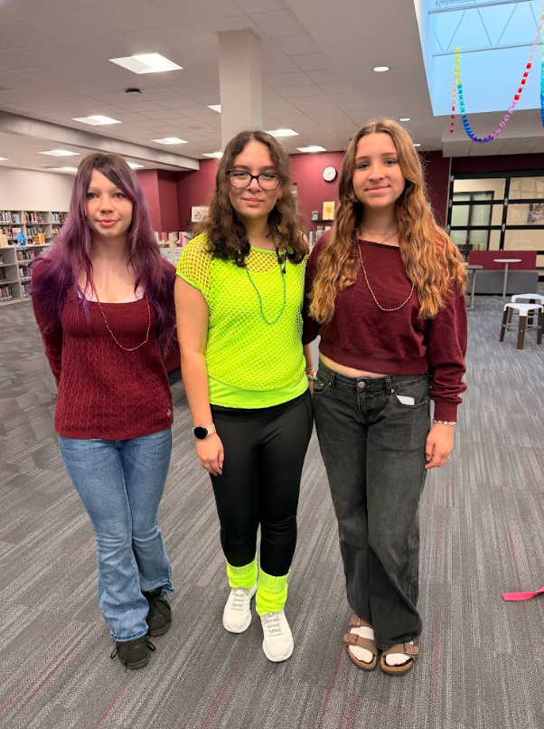 Students in neon and beads