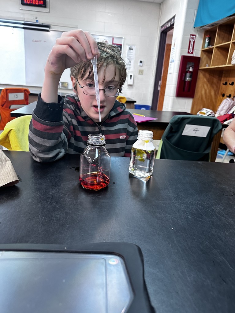 6th graders designed an experiment to show how clouds hold water droplets and hypothesized about when drops would break out as precipitation.