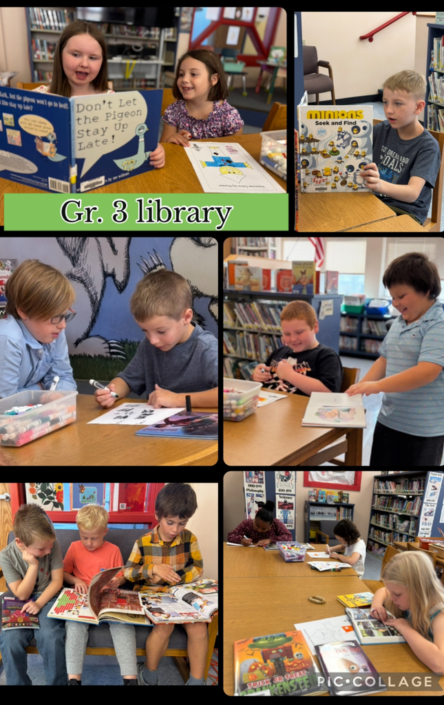 Third graders read in the library.