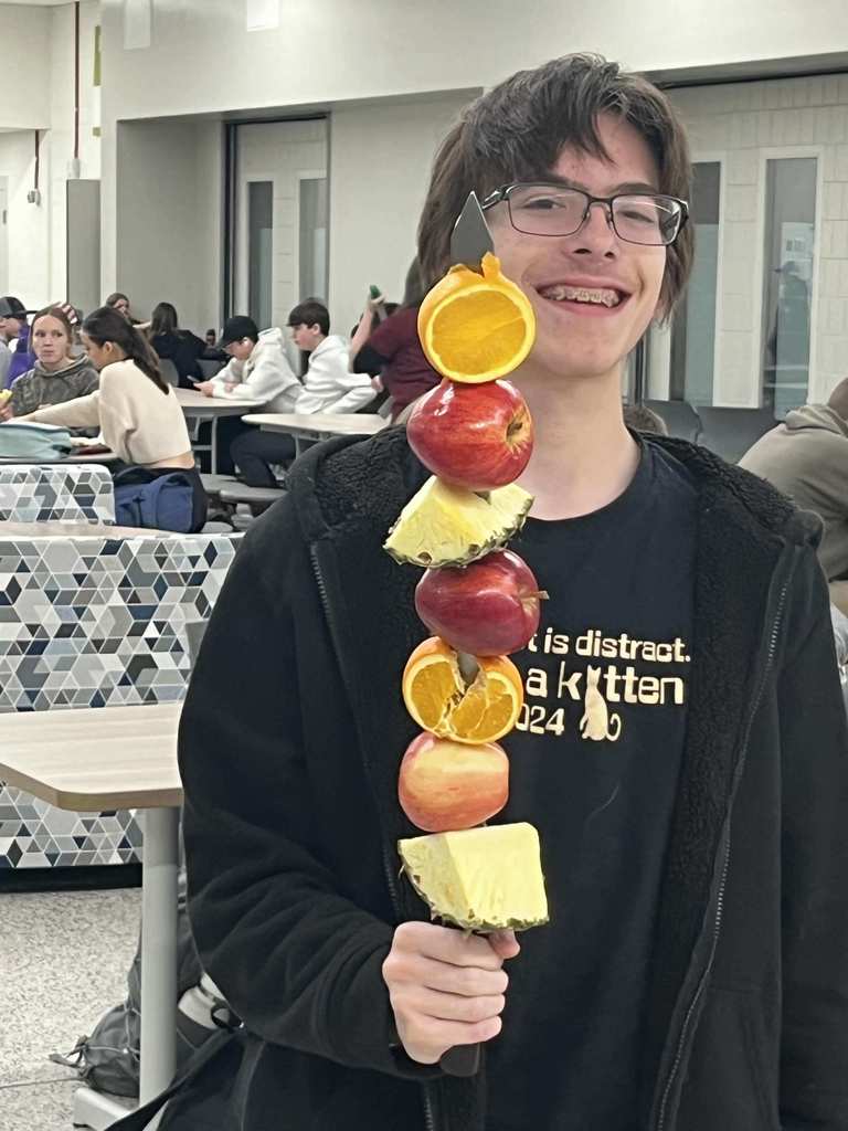 Holding the fruit sword