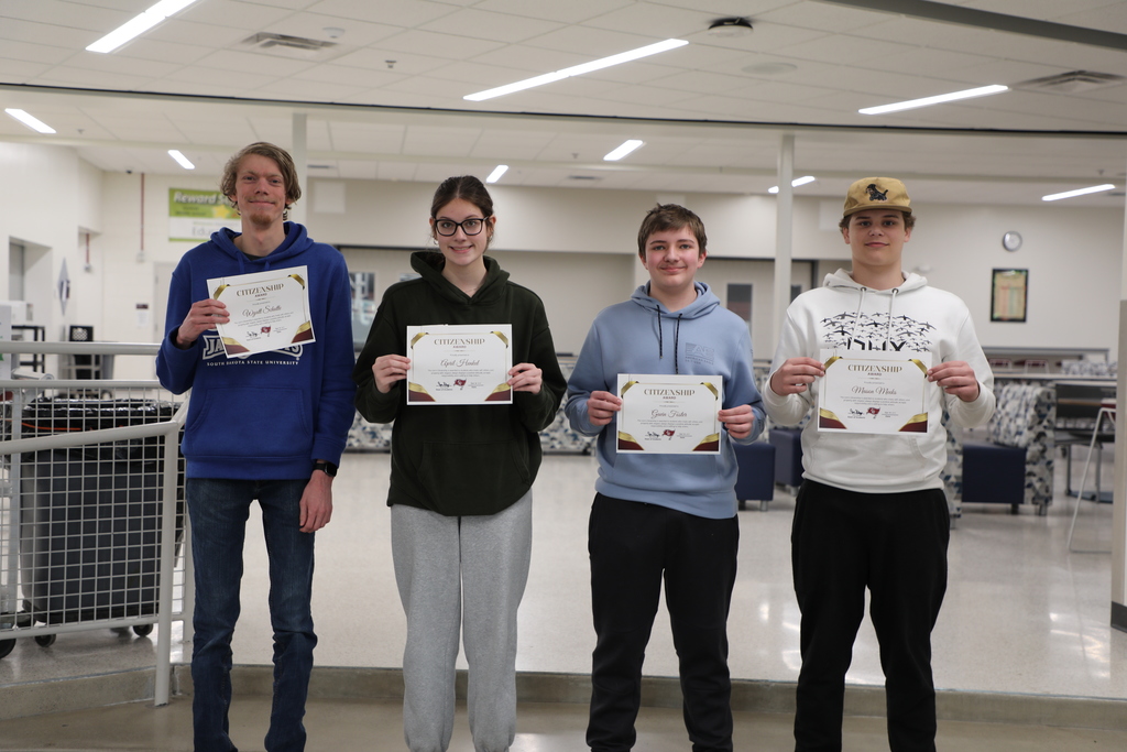 4 Students holding awards for being good role models