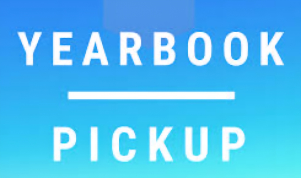 Sign that says "Yearbook Pick Up: