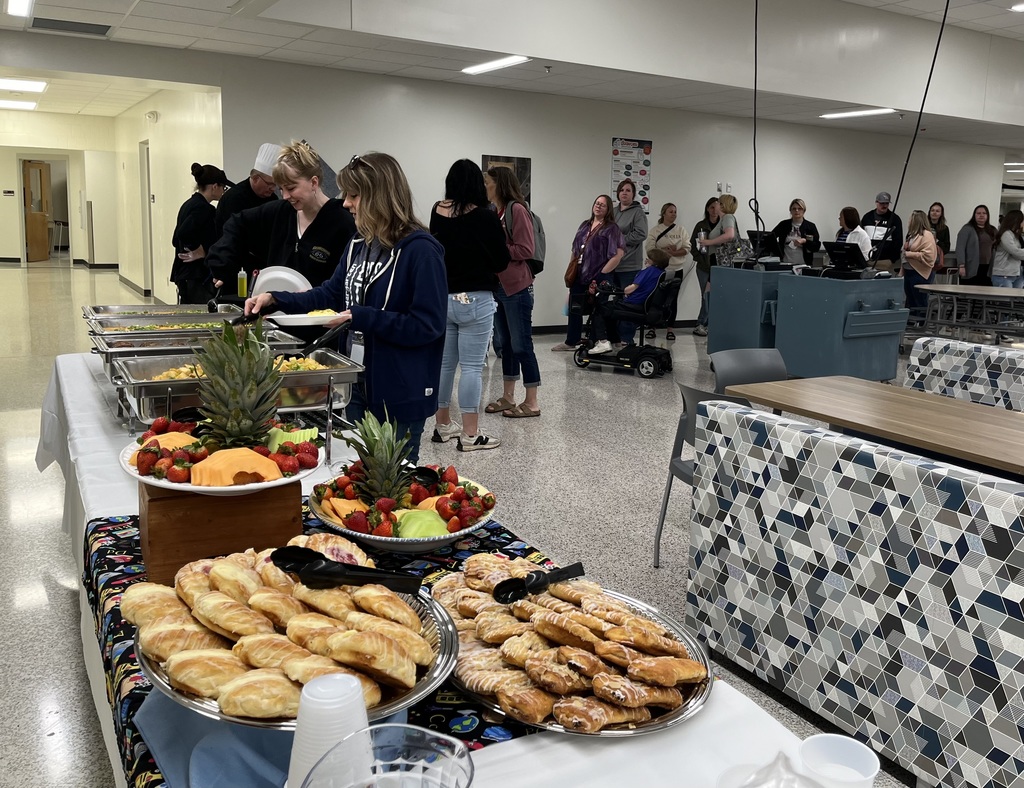 staff lining up for breakfast