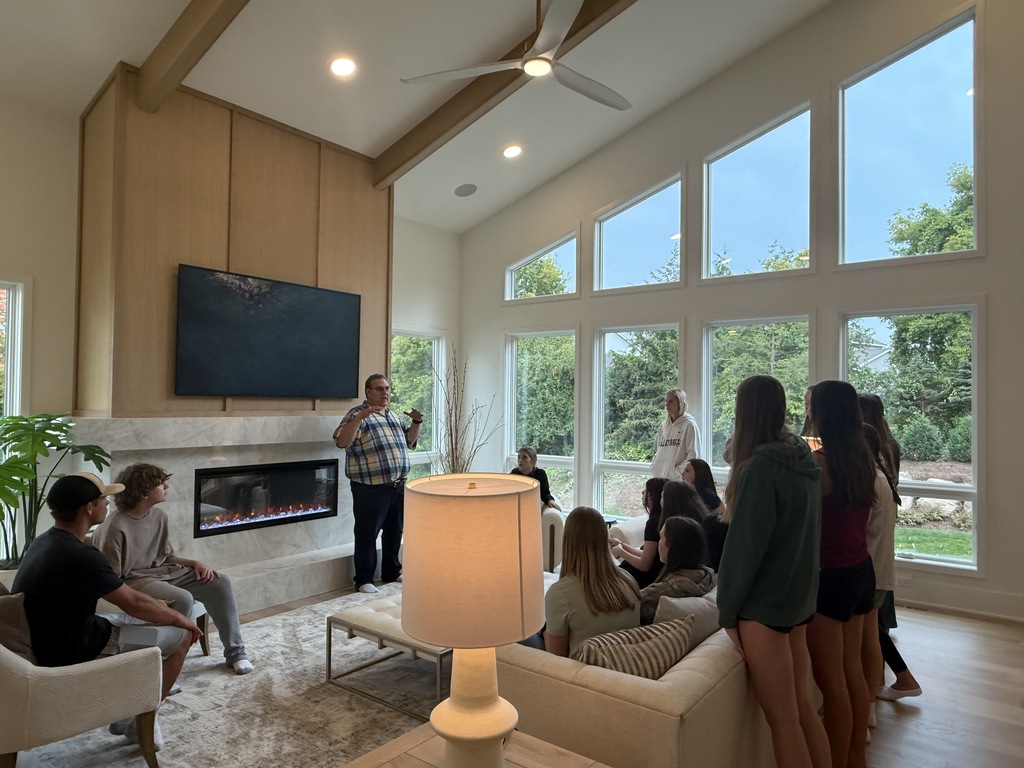 Students on a parade of homes tour