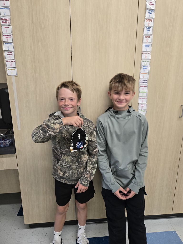 fifth grade students creating model designs of hiking backpacks