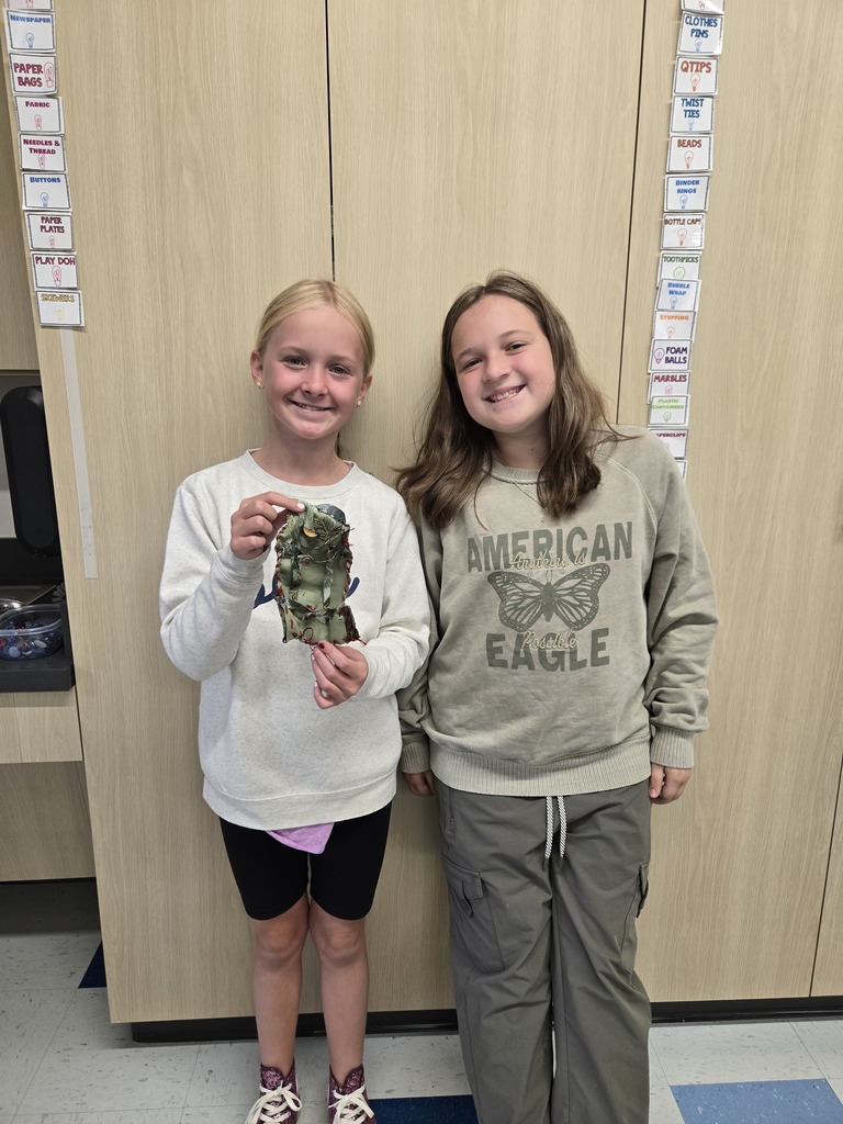 fifth grade students creating model designs of hiking backpacks