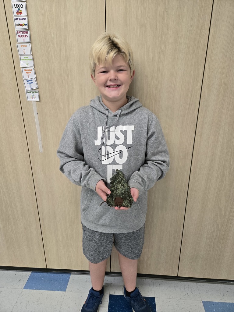 fifth grade students creating model designs of hiking backpacks