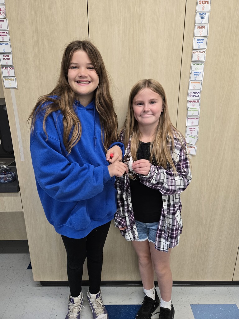 fifth grade students creating model designs of hiking backpacks