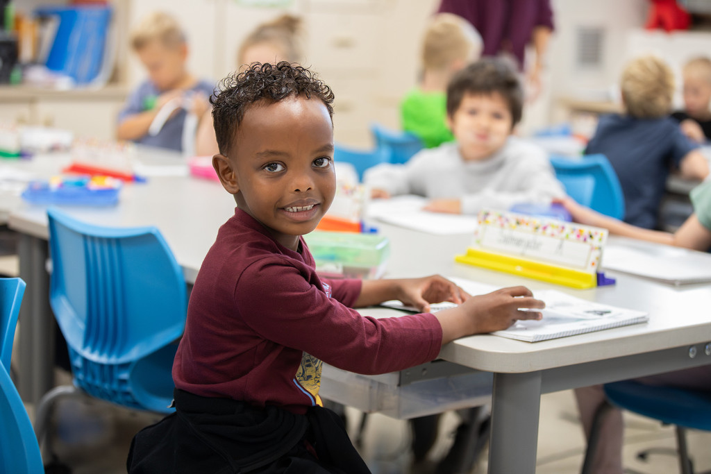 young student smiling at the camera