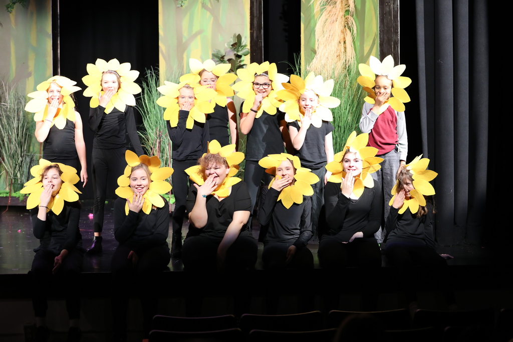 The cast of "Shrek the Musical Jr." on stage. 