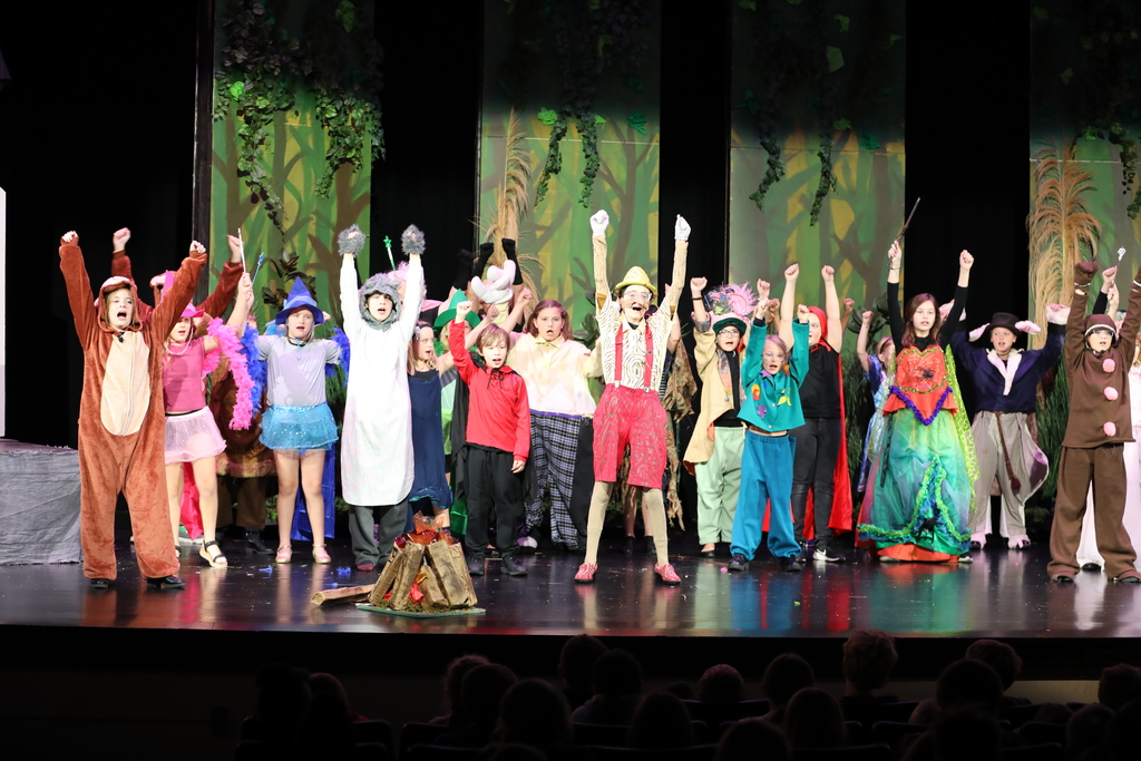 The cast of "Shrek the Musical Jr." on stage. 