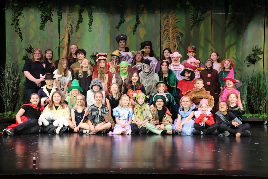 The cast of "Shrek the Musical Jr." on stage. 