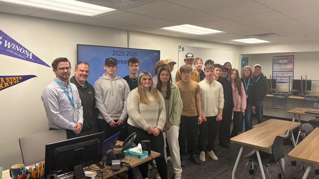 Students and staff in a classroom